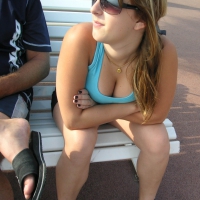Girl leaning over to show off her nice tits while sitting on a bench MJ99_PICT0051.jpg