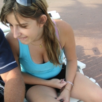 Girl leaning over to show off her nice tits while sitting on a bench MJ99_PICT0075.jpg