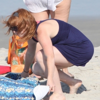 Pale redhead girl with thick booty and flat chest on the beach in her bikini jIMG_9077.jpg