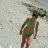 Sexy girl on the beach in her green thong bikini CS_007.JPG