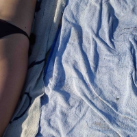 Hot girl laying on the beach in her purple bikini Bikniday (1).jpg