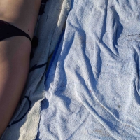 Hot girl laying on the beach in her purple bikini Bikniday (27).jpg