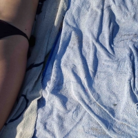 Hot girl laying on the beach in her purple bikini Bikniday (26).jpg