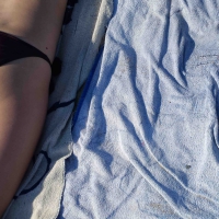 Hot girl laying on the beach in her purple bikini Bikniday (28).jpg