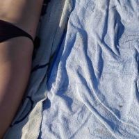 Hot girl laying on the beach in her purple bikini Bikniday (29).jpg