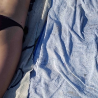 Hot girl laying on the beach in her purple bikini Bikniday (31).jpg