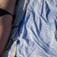Hot girl laying on the beach in her purple bikini Bikniday (43).jpg