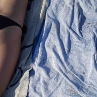 Hot girl laying on the beach in her purple bikini Bikniday (42).jpg