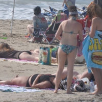 Bikini girls setting up for a day on the beach in their bikinis MKini_0047.JPG