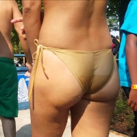 Sexy latino booty in gold bikini at Wonderland Wonderland latino booty