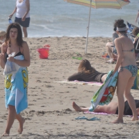 Bikini girls setting up for a day on the beach in their bikinis MKini_0050.JPG
