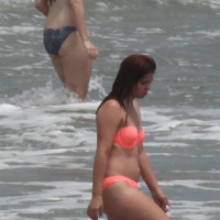 Thick girl in orange bikini playing on the beach 1_IMG_2019.JPG