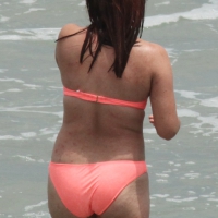 Thick girl in orange bikini playing on the beach 1_IMG_1993.JPG