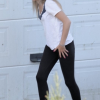 Cute skinny motorcycle girl in tight leggings 39866556PTa.jpg