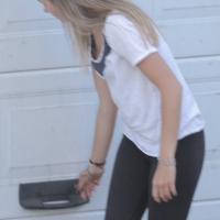 Cute skinny motorcycle girl in tight leggings 39866555QUg.jpg