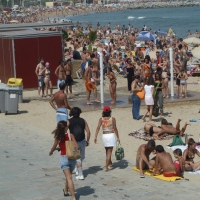 Topless girls on a beach in Barcelona 0001.jpg