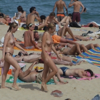 Topless girls on a beach in Barcelona 0032.jpg