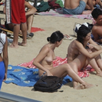 Topless girls on a beach in Barcelona 0101.jpg