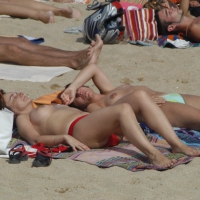 Topless girls on a beach in Barcelona 0106.jpg