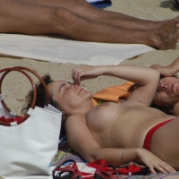 Topless girls on a beach in Barcelona 0107.jpg