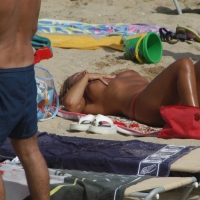 Topless girls on a beach in Barcelona 0121.jpg