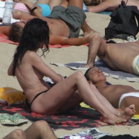 Topless girls on a beach in Barcelona 0128.jpg
