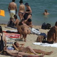 Topless girls on a beach in Barcelona 0140.jpg
