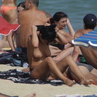 Topless girls on a beach in Barcelona 0161.jpg