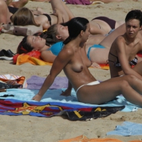 Topless girls on a beach in Barcelona 0166.jpg