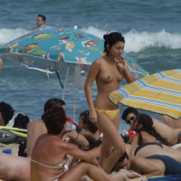 Topless girls on a beach in Barcelona 0203.jpg