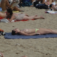 Topless girls on a beach in Barcelona 0201.jpg