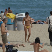 Topless girls on a beach in Barcelona 0205.jpg