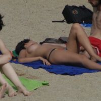 Topless girls on a beach in Barcelona 0003.jpg