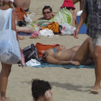 Topless girls on a beach in Barcelona 0001.jpg