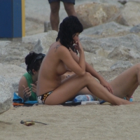 Topless girls on a beach in Barcelona 0084.jpg