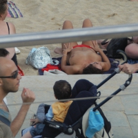 Topless girls on a beach in Barcelona 0107.jpg