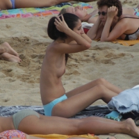 Topless girls on a beach in Barcelona 0114.jpg