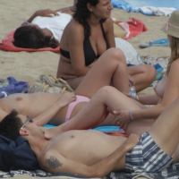 Topless girls on a beach in Barcelona 0118.jpg