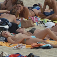 Topless girls on a beach in Barcelona 0121.jpg