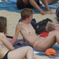 Topless girls on a beach in Barcelona 0119.jpg
