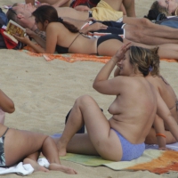 Topless girls on a beach in Barcelona 0124.jpg
