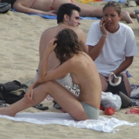 Topless girls on a beach in Barcelona 0127.jpg