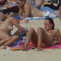 Topless girls on a beach in Barcelona 0140.jpg
