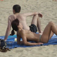 Topless girls on a beach in Barcelona 0145.jpg