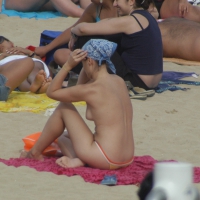 Topless girls on a beach in Barcelona 0161.jpg