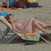 Topless girls on a beach in Barcelona 0182.jpg