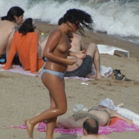 Topless girls on a beach in Barcelona 0184.jpg