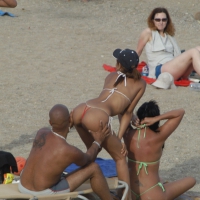 Topless girls on a beach in Barcelona 0197.jpg