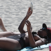 Puffy black nip slip on beach IMG_7988.jpg