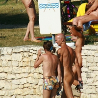 Two cute nudist girls showering completely naked on a hot day at the beach 0019.jpg